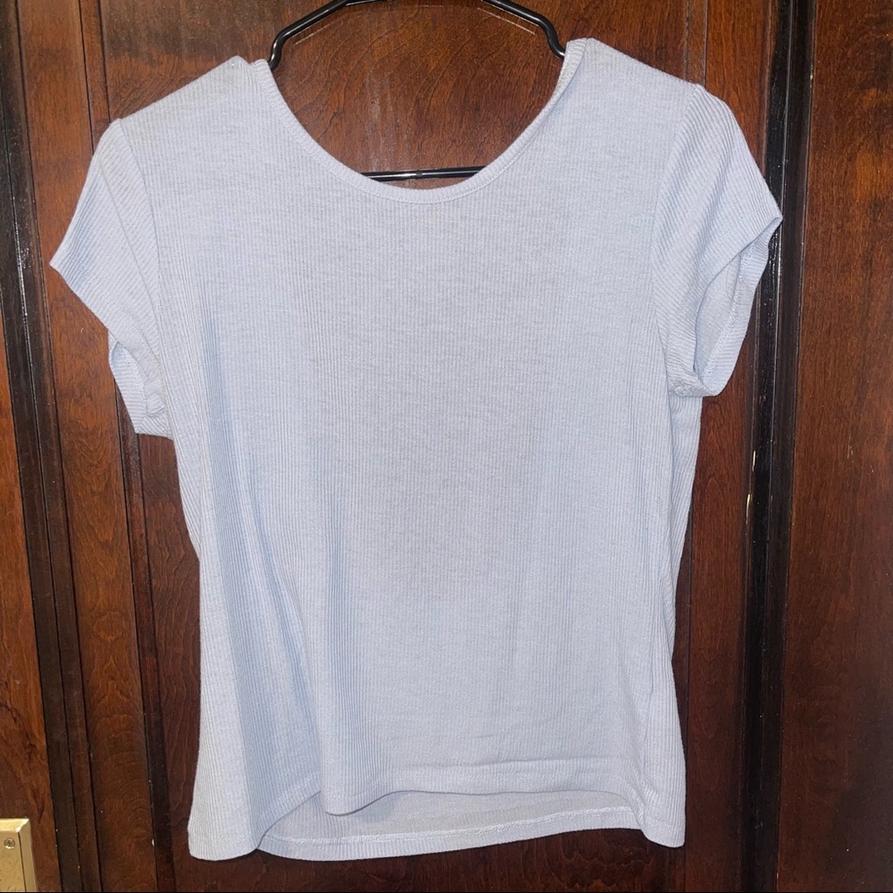 Light blue open back tee 💙 comfortable and casual.